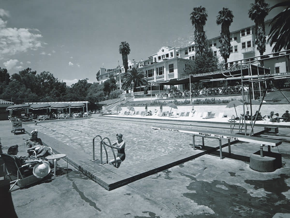 The hotel’s swimming pool, seen here in 1938, was ringed by golden sand shipped in especially from Arizona and has seen its fair share of sensational activity (Beverly Hills Hotel)