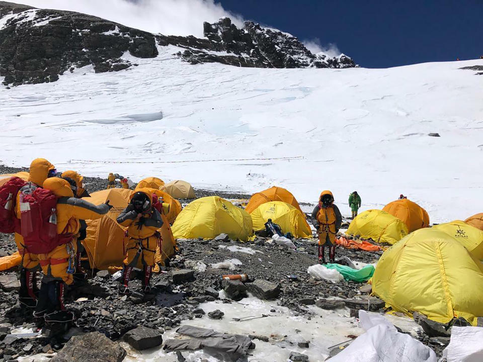 This May 21, 2019, photo provided by climber Dawa Steven Sherpa shows Camp Four, the highest camp on Mount Everest littered with abandoned tents. The record number of climbers on Mount Everest this season has left a cleanup crew grappling with how to clear away everything from abandoned tents to human waste that threatens drinking water. (Dawa Steven Sherpa/Asian Trekking via AP)