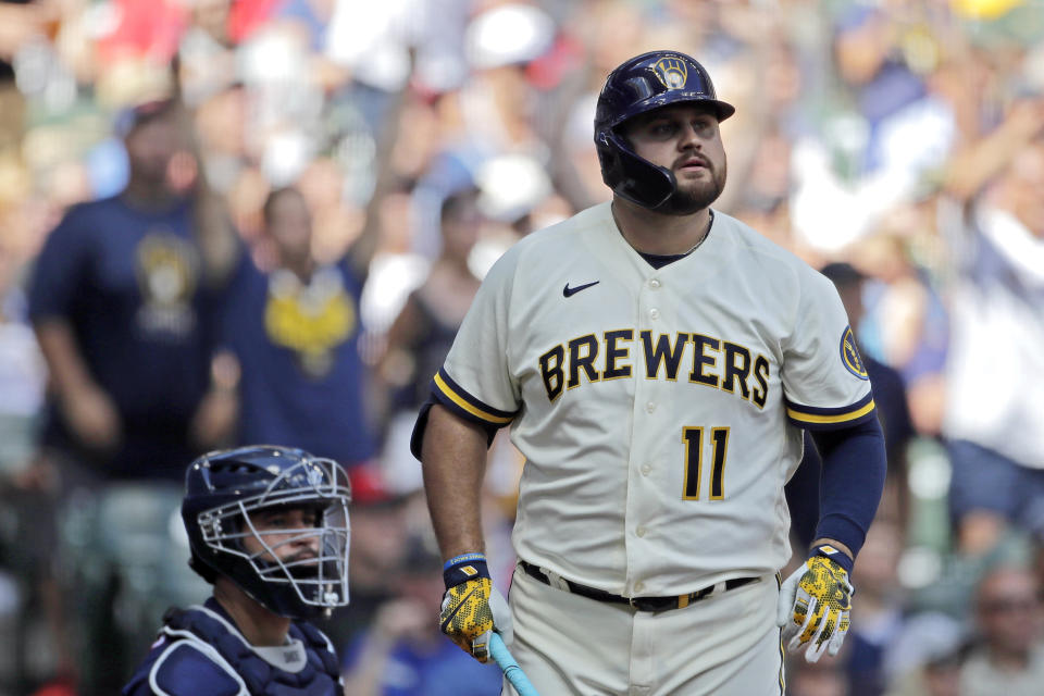 Milwaukee Brewers' Rowdy Tellez watches his three-run home run during the fourth inning of a baseball game against the Minnesota Twins Wednesday, July 27, 2022, in Milwaukee. (AP Photo/Aaron Gash)