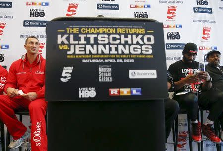 Reigning heavyweight champion Wladimir Klitschko (L) of Ukraine takes part in a news conference with challenger Bryant Jennings of the U.S. ahead of their fight in New York April 21, 2015. REUTERS/Shannon Stapleton