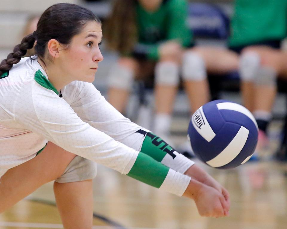 McGuinness' Taylor Vann hits the ball during Monday's match at Southmoore. The Class 5A top-ranked Fighting Irish swept Southmoore, 25-17, 25-21, 25-14.