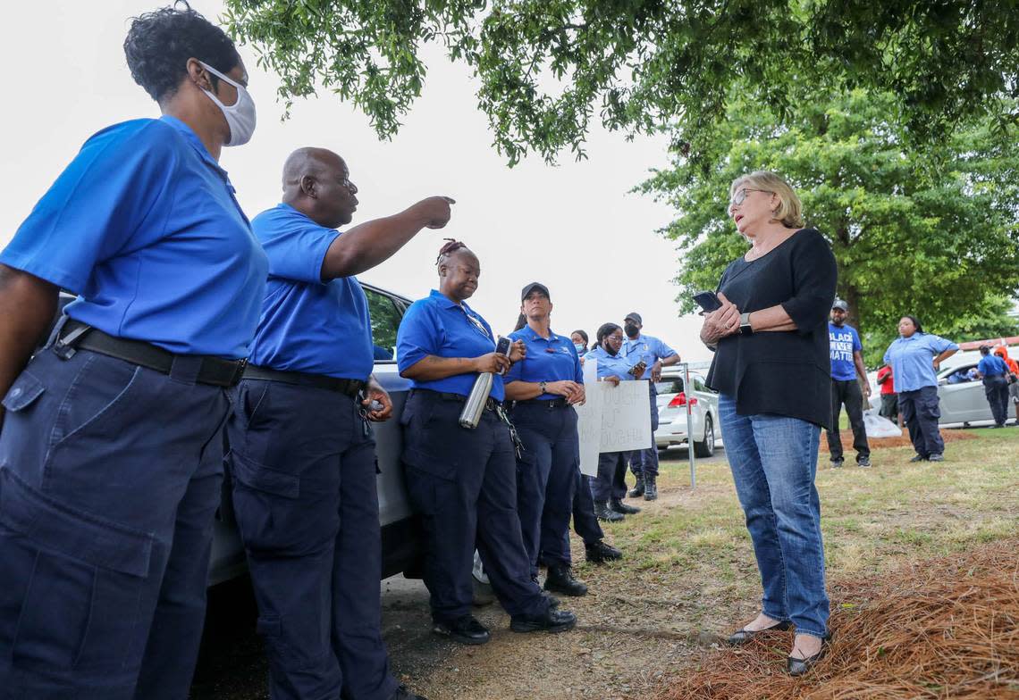 Sen. Katrina Shealy, R-Lexington, talks with corrections workers and support staff who are protesting conditions at DJJ. Corrections officers and support staff are protesting the working conditions at DJJ. Workers have been regularly working 24-36 hour sifts with no breaks.