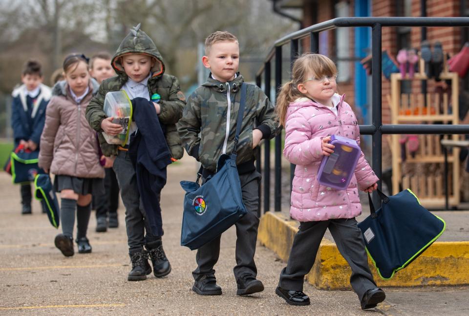 Children arrive at Thomas Bullock Church of England Primary Academy in Shipdham in NorfolkPA Wire