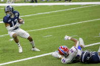 Georgia Southern cornerback Derrick Canteen (13) grabs an interception intended for Louisiana Tech wide receiver Tahj Magee (89) during the first half of the New Orleans Bowl NCAA college football game in New Orleans, Wednesday, Dec. 23, 2020. (AP Photo/Matthew Hinton)