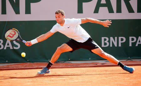 Tennis - French Open - Roland Garros, Paris, France - May 30, 2018 Bulgaria's Grigor Dimitrov in action during his second round match against Jared Donaldson of the U.S. REUTERS/Charles Platiau
