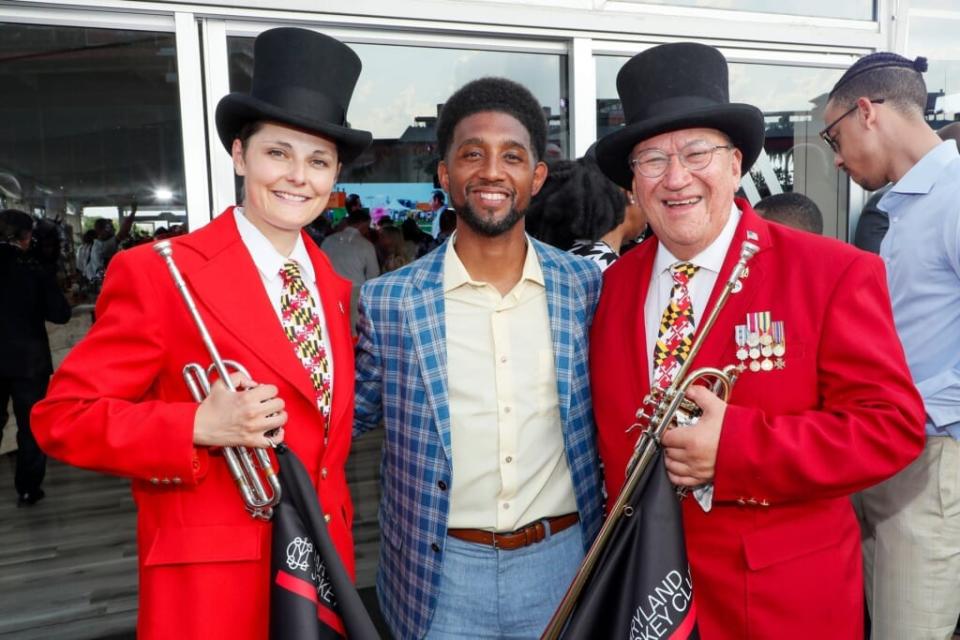 Mayor Brandon Scott (C) poses with Riders Up Buglers during Preakness 147 in the 1/ST Chalet hosted by 1/ST at Pimlico Race Course on May 21, 2022 in Baltimore, Maryland. (Photo by Paul Morigi/Getty Images for 1/ST)