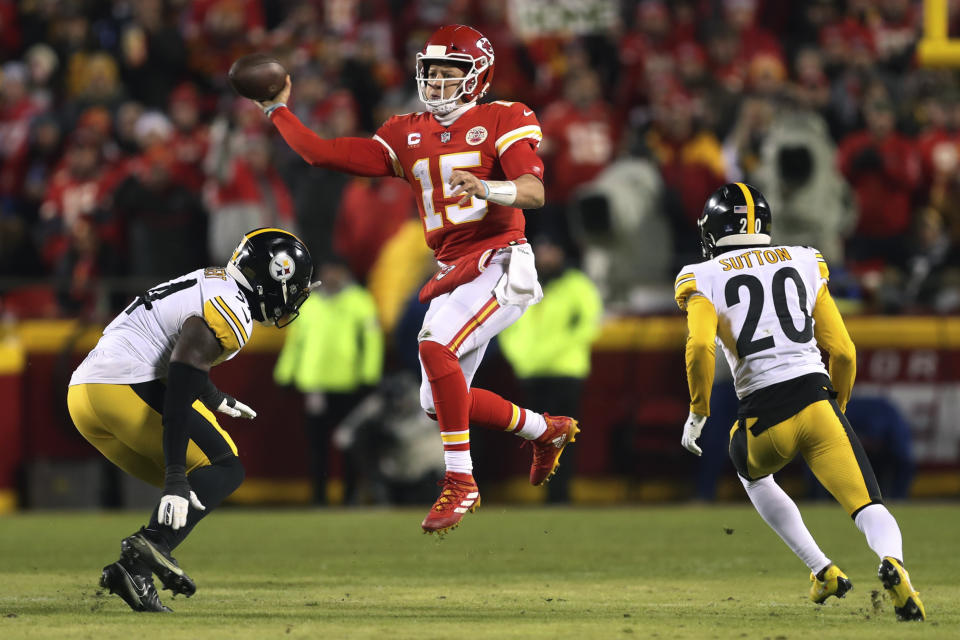 FILE - Kansas City Chiefs quarterback Patrick Mahomes, 15, throws a pass during the first half of an NFL playoff football game against the Pittsburgh Steelers, Sunday, Jan. 16, 2022, in Kansas City, Missouri.  Netflix and the NFL announced a three-year deal on Wednesday, May 15, 2024, to stream games on Christmas Day, which includes the Chiefs taking on the Steelers on Dec. 25, 2024. (AP Photo/Travis Heying, File)