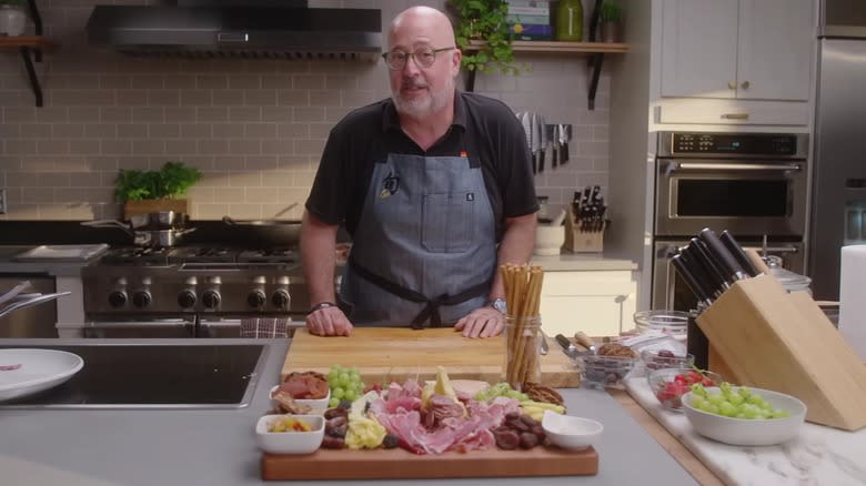 Zimmern standing over kitchen counter