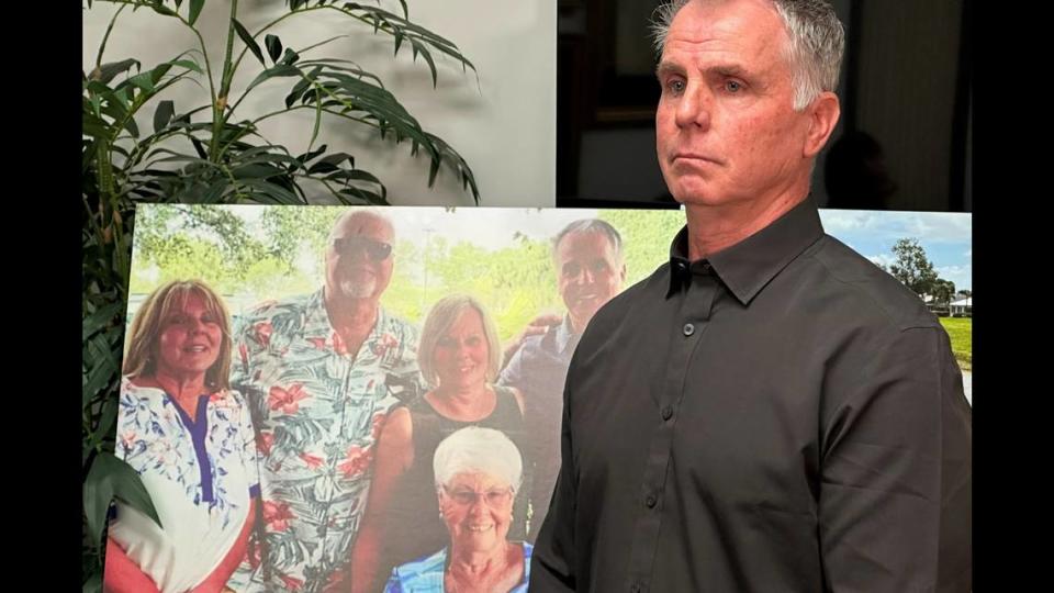 Bill Serge stands next to a photo on Thursday, Jan. 25, 2024, in West Palm Beach, Fla. of his 85-year-old mother, Gloria Serge, who was killed in an alligator attack on Feb. 20, 2023.