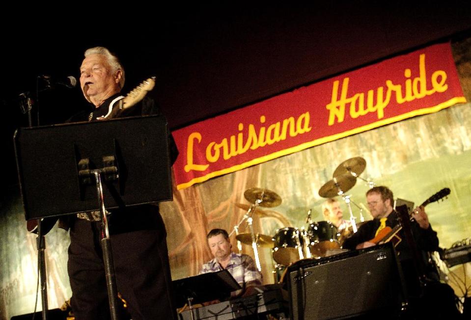 In a Feb. 24, 2008 photo Country musician Claude King performs during a Louisiana Hayride show at the Municipal Auditorium in Shreveport, La. Country singer-songwriter Claude King, an original member of the Louisiana Hayride who was best known for the 1962 hit "Wolverton Mountain," has died. He was 90. (AP Photo/The Shreveport Times, Val Horvath) MAGS OUT; MANDATORY CREDIT SHREVEPORTTIMES.COM; NO SALES