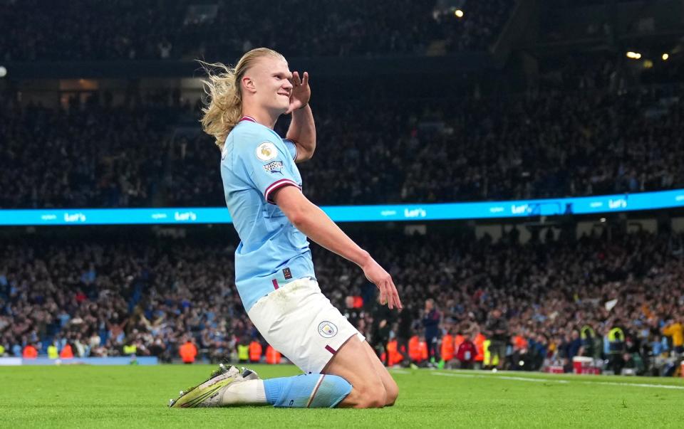 Erling Haaland of Manchester City celebrates after scoring the team's fourth goal during the Premier League match between Manchester City and Arsenal FC - Lexy Ilsley/Manchester City FC via Getty Images