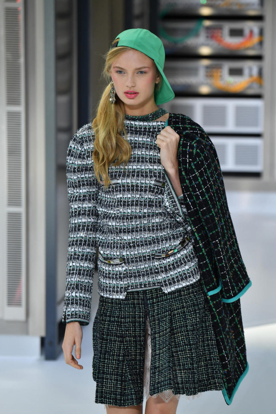 And let’s not forget Chanel’s classic matchy tweed look, shown in green here.