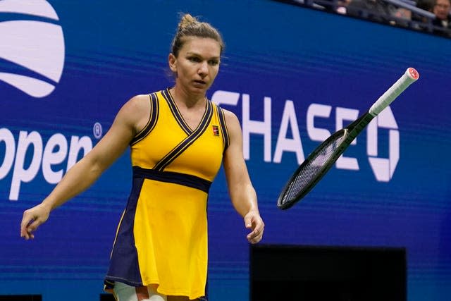 Simona Halep tosses her racket in her defeat to Elina Svitolina