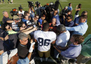 St. Louis Rams defensive end Michael Sam speaks to the media following practice at the NFL football team's training camp facility Tuesday, July 29, 2014, in St. Louis. (AP Photo/Jeff Roberson)