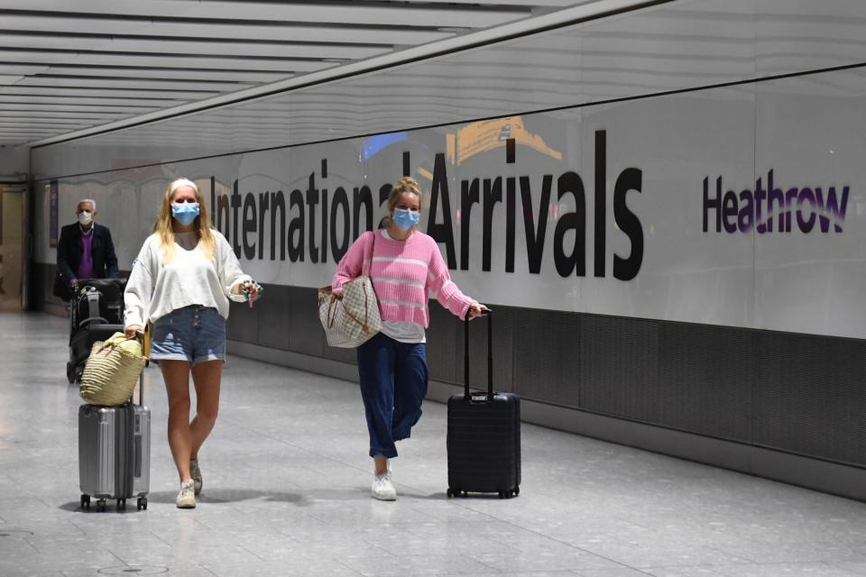 Arrivals at Heathrow (PA)