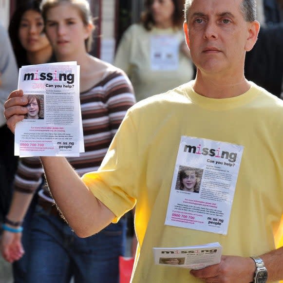 Kevin Gosden hands out leaflets showing his missing son Andrew