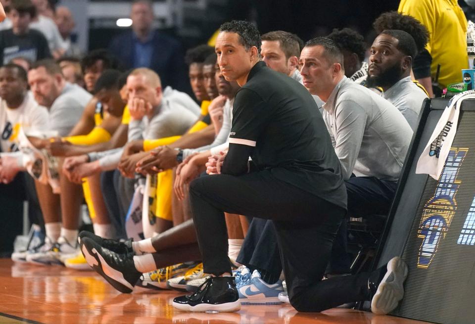Marquette coach Shaka Smart watches the final minute of the team's college basketball game against North Carolina from the bench in the first round of the NCAA men's tournament in Fort Worth, Texas, Thursday, March 17, 2022.