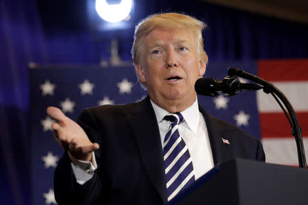 U.S. President Donald Trump delivers remarks before signing an executive order on strengthening retirement security in America at Harris Conference Center in Charlotte, NC, U.S., August 31, 2018. REUTERS/Yuri Gripas