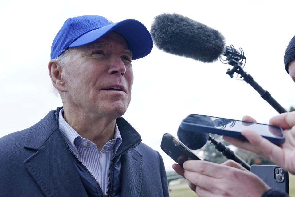 President Joe Biden talks with reporters after returning on the South Lawn of the White House in Washington, Monday, Feb. 6, 2023, from a weekend at Camp David in Maryland. (AP Photo/Susan Walsh)