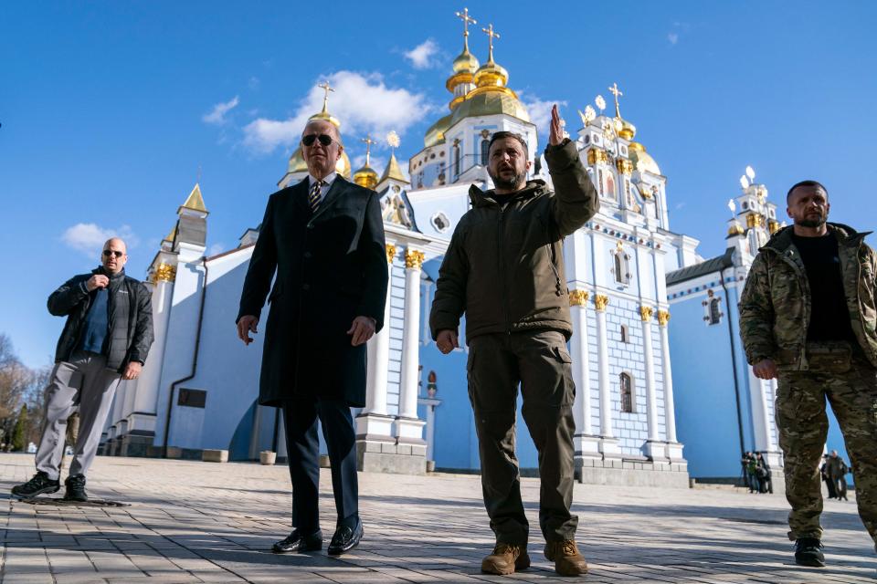 February 20, 2023: US President Joe Biden (C-L) walks with Ukrainian President Volodymyr Zelensky (C-R) at St. Michael's Golden-Domed Cathedral during an unannounced visit, to Kyiv. - US President Joe Biden promised increased arms deliveries for Ukraine during a surprise visit to Kyiv, in which he also vowed Washington's "unflagging commitment" to defending Ukraine's territorial integrity.