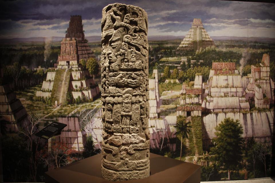 The stone Copan Stela 11 is shown at the Maya 2012: Lords of Time exhibit at the University of Pennsylvania Museum of Archaeology and Anthropology Thursday, May 3, 2012, in Philadelphia. The exhibit is scheduled to open May 5. (AP Photo/Matt Rourke)