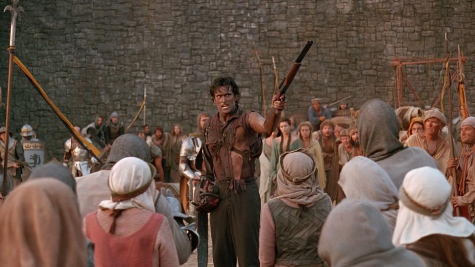 <p>“Shop Smart. Shop, S-Mart.”</p><p>Depending on who you ask, Sam Raimi’s <em><a href="https://www.amazon.com/Army-Darkness-Bruce-Campbell/dp/B002KC8BSO/?tag=syn-yahoo-20&ascsubtag=%5Bartid%7C10054.g.42709440%5Bsrc%7Cyahoo-us" rel="nofollow noopener" target="_blank" data-ylk="slk:Army of Darkness;elm:context_link;itc:0" class="link ">Army of Darkness</a></em> is either the best sequel to any film ever, or the worst—there isn’t much room in between. The chainsaw-toting Ashley “Ash” Williams is tossed back to medieval times where he must fight off a horde of <a href="https://www.popularmechanics.com/culture/movies/g30714252/best-zombie-movies/" rel="nofollow noopener" target="_blank" data-ylk="slk:undead monstrosities;elm:context_link;itc:0" class="link ">undead monstrosities</a> with only his ingenuity and his “boom stick.”</p><p>Even though it’s slapstick comedy with wonderfully B-movie action sequences, it remains an absolute joy to watch.</p>