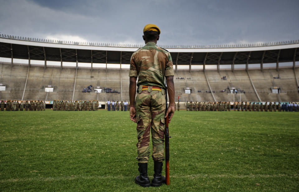 <p>A Zimbabwean soldier stands to attention during a dress rehearsal ahead of Friday’s presidential inauguration of Emmerson Mnangagwa, at the National Sports Stadium in Harare, Zimbabwe Thursday, Nov. 23, 2017. (Photo: Ben Curtis/AP) </p>