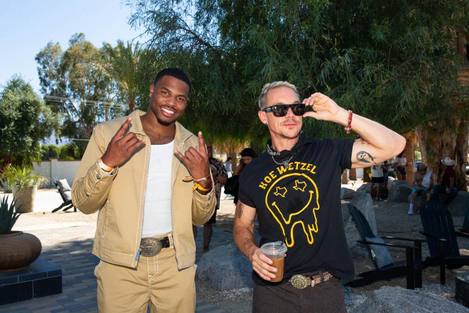 Zay Wilson of the TV show "The Ultimatum: Marry or Move On" poses with Stagecoach performer Diplo at the Swimsuits & Cowboy Boots celebration with PATRÓN EL ALTO tequila at Gallery Desert House by Gallery Media Group during Stagecoach on Sunday, April 28, 2024.