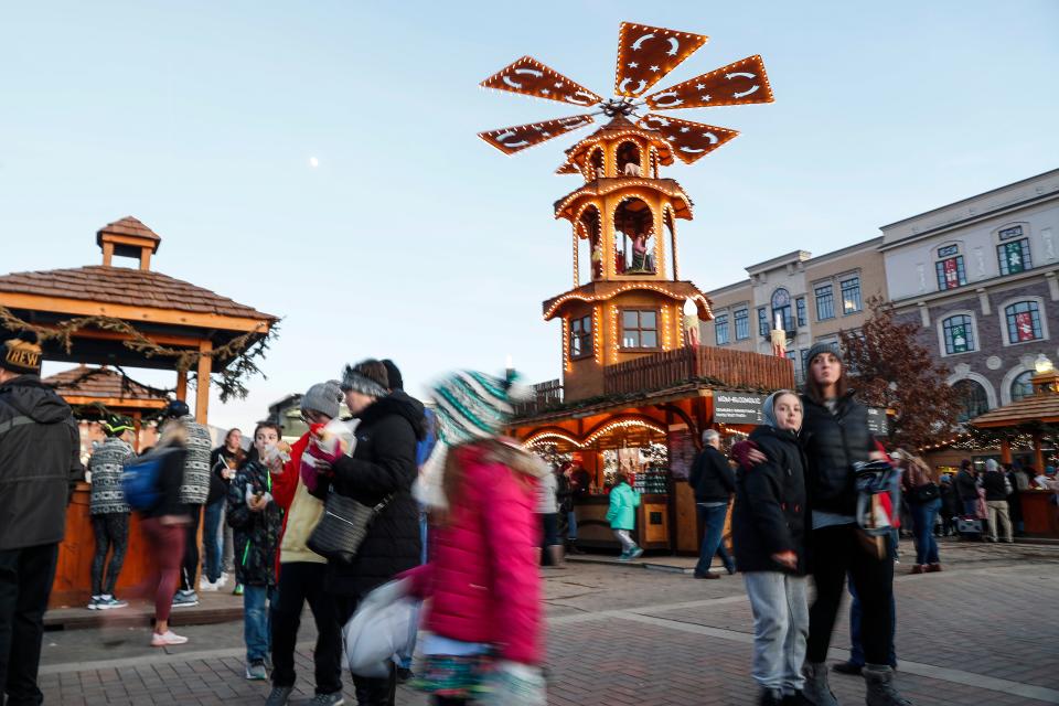 The annual Carmel Christkindlmarkt lit up downtown Carmel, Ind., on Saturday, Dec. 7, 2019. The Christkindlmarkt features ice skating, festive food, activities, shops and hot chocolate.