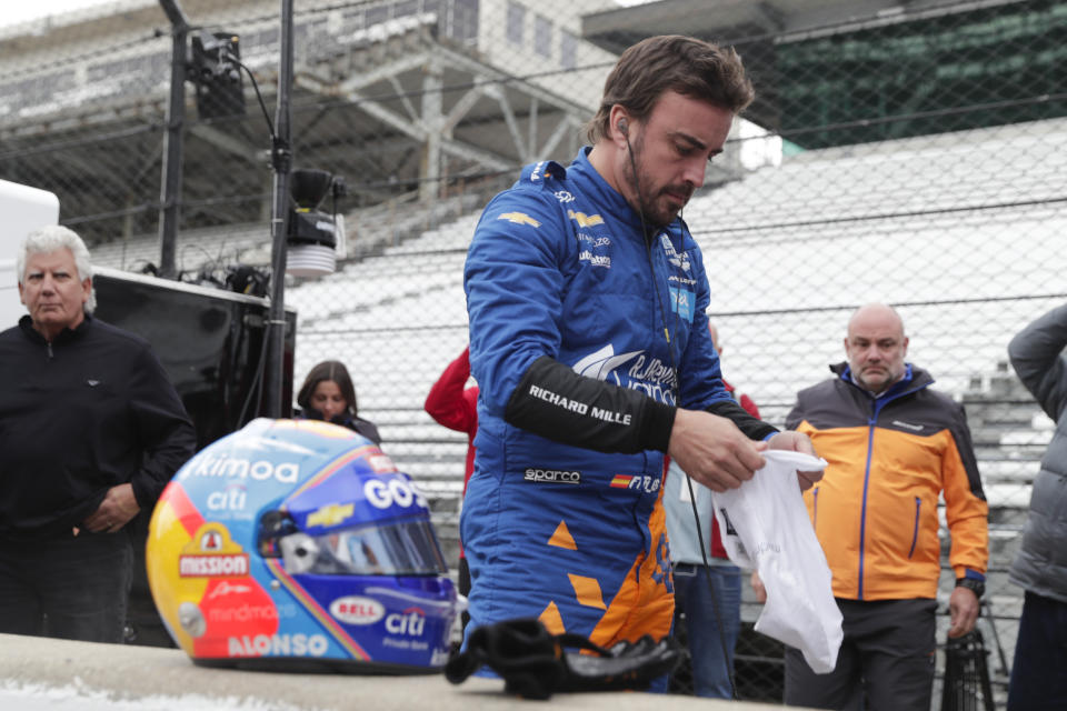 IndyCar driver Fernando Alonso, of Spain, prepares to drive during testing at the Indianapolis Motor Speedway in Indianapolis, Wednesday, April 24, 2019. (AP Photo/Michael Conroy)