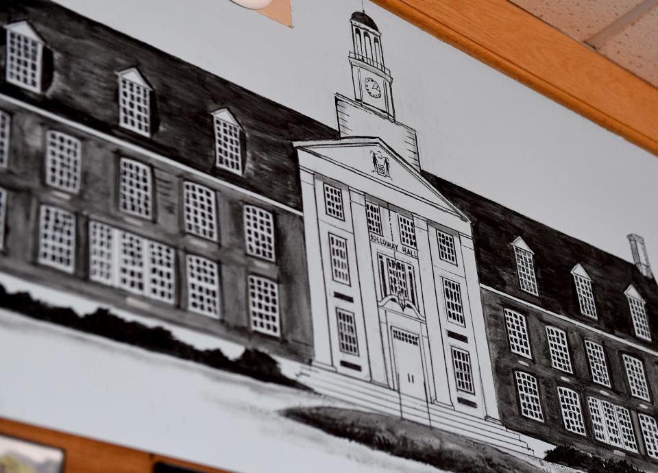 A mural depicting Holloway Hall at Salisbury University, the City Park Bridge, the courthouse and The Ross at the Bagel Bakery Cafe was created by Denny McLeod in Salisbury, Maryland.