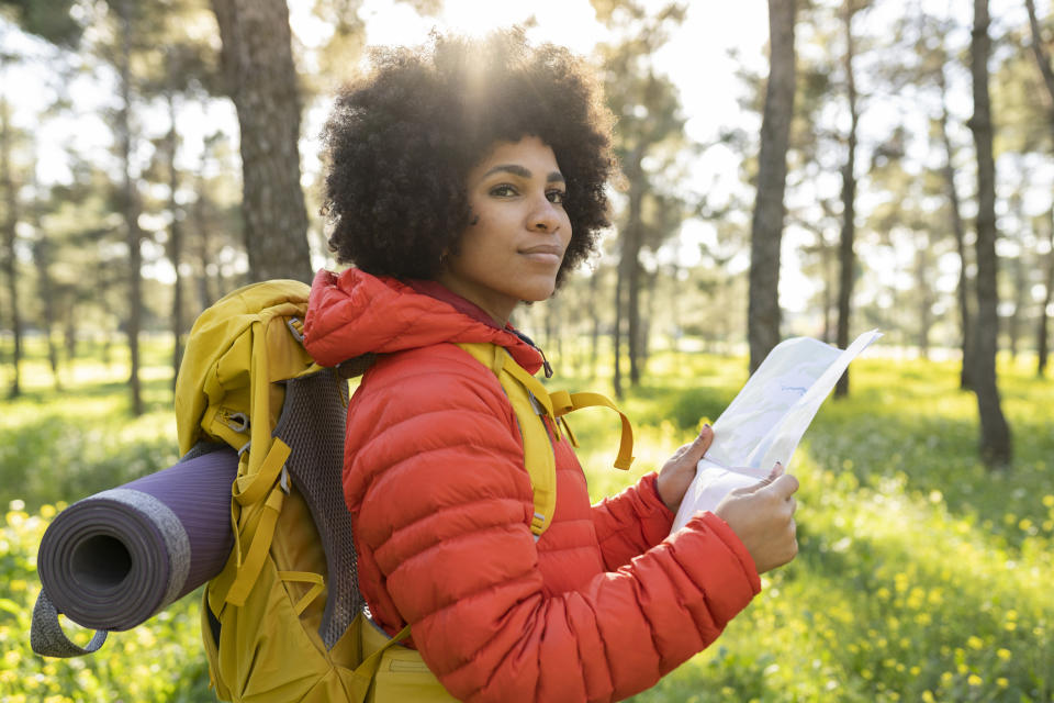 hiker looking at a map