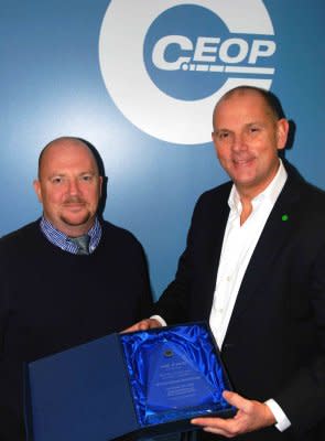 Evin Daly, CEO, One Child presents the award to Jim Gamble, CEO of the CEOP London