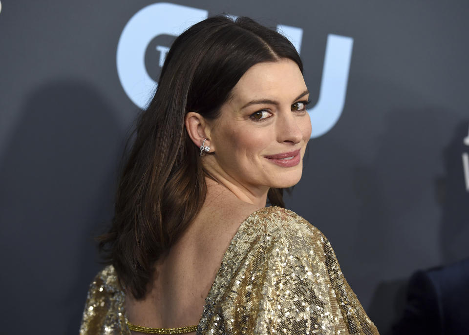 Anne Hathaway arrives at the 25th annual Critics' Choice Awards on Sunday, Jan. 12, 2020, at the Barker Hangar in Santa Monica, Calif. (Photo by Jordan Strauss/Invision/AP)