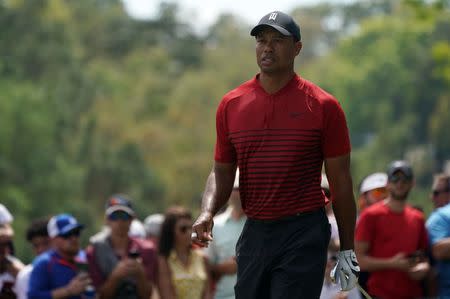 Mar 11, 2018; Palm Harbor, FL, USA; Tiger Woods walks off the 2nd tee during the final round of the Valspar Championship golf tournament at Innisbrook Resort - Copperhead Course. Jasen Vinlove-USA TODAY Sports