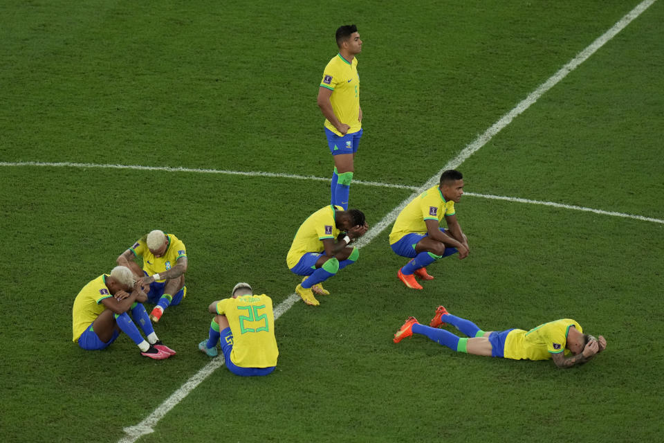 Brazil players react after their loss in the World Cup quarterfinal soccer match against Croatia, at the Education City Stadium in Al Rayyan, Qatar, Friday, Dec. 9, 2022. (AP Photo/Alessandra Tarantino)