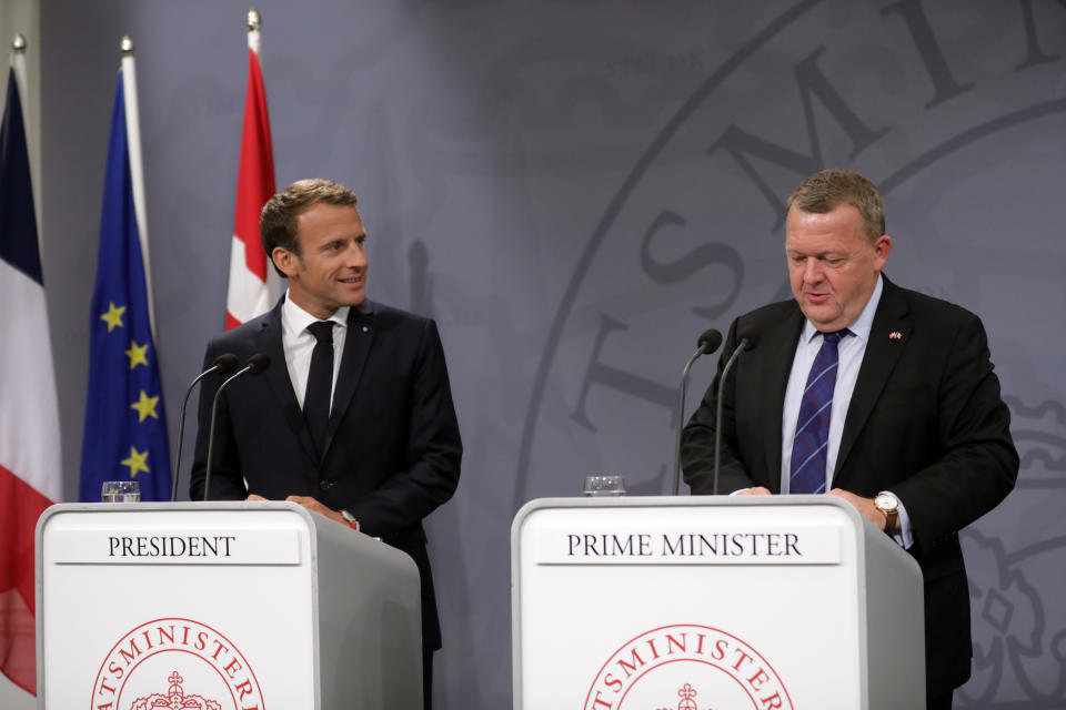 French President Emmanuel Macron, left, looks at Danish Prime Minister Lars Loekke Rasmussen during their joint press conference at Christiansborg Castle Castle in Copenhagen Denmark, Tuesday Aug. 28, 2018. Macron is on a two-day visit, hoping to build the relationships he needs to push France’s agenda of a more closely united European Union. (Olafur Steinar Gestsson/Ritzau Scanpix via AP)