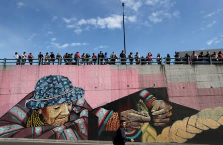 Trucks block main roads during protests after Ecuador's President Lenin Moreno's government ended four-decade-old fuel subsidies, in Carapungo, near Quito