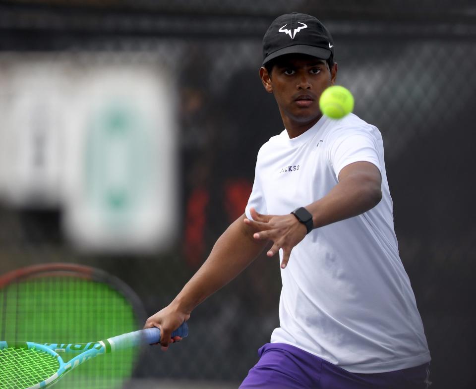 Jackson's Ishan Tripathy during first doubles plays against Green in Federal League Boys Tennis Tournament at Jackson North Park. Saturday, April 27, 2024.