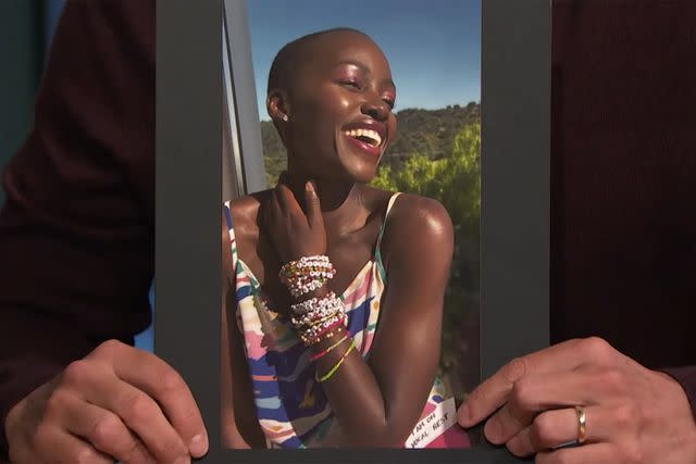 <p>Late Night with Seth Meyers/Youtube</p> Seth Meyers holds up photo of Lupita Nyong'o