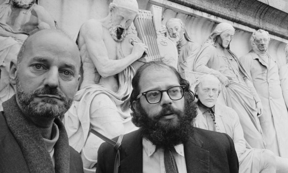 Lawrence Ferlinghetti, left, and Allen Ginsberg at the Albert Memorial, near the Royal Albert Hall, London, where they were taking part in the International Poetry Incarnation, 1965.