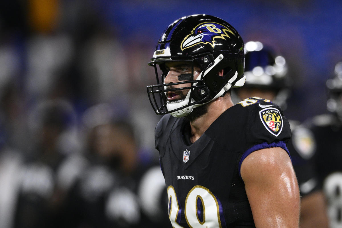 Baltimore Ravens tight end Mark Andrews looks on from the sideline