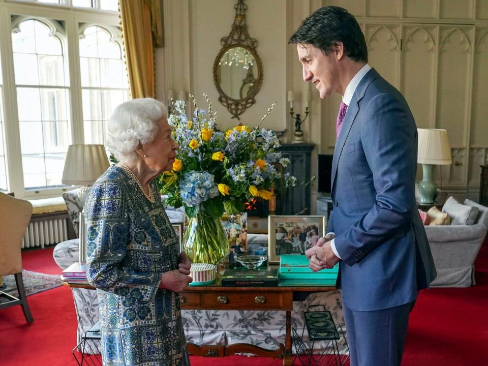 Queen Elizabeth and Justin Trudeau speak at Windsor Castle.