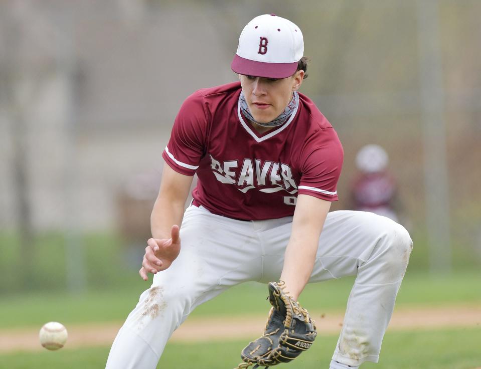 Beaver pitcher Ty Butler fields the ball during Tuesday's game against Central Valley at Hardy Field in Brighton Township.