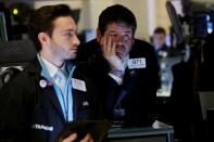 Traders work on the floor of the New York Stock Exchange (NYSE) in New York