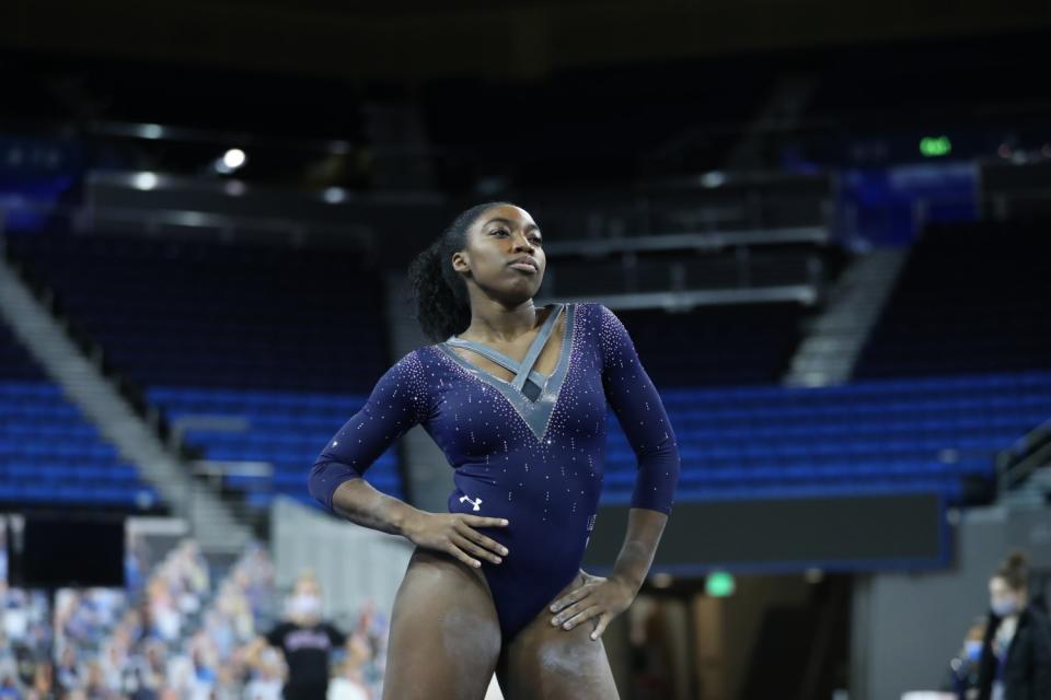 UCLA gymnast Chae Campbell practices a floor exercise routine.