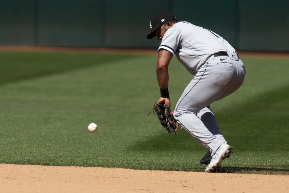 Chicago White Sox second baseman Elvis Andrus (1) misplays a ground ball by Oakland Athletics' JJ Bleday during the tenth inning of a baseball game, Saturday, July 1, 2023, in Oakland, Calif. Andrus' error allowed Athletics' Tyler Wade to score the winning run. (AP Photo/D. Ross Cameron)