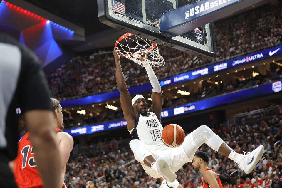United States center Bam Adebayo (13) dunks during the first half of an exhibition basketball game against Canada, Wednesday, July 10, 2024, in Las Vegas. (AP Photo/Steve Marcus)