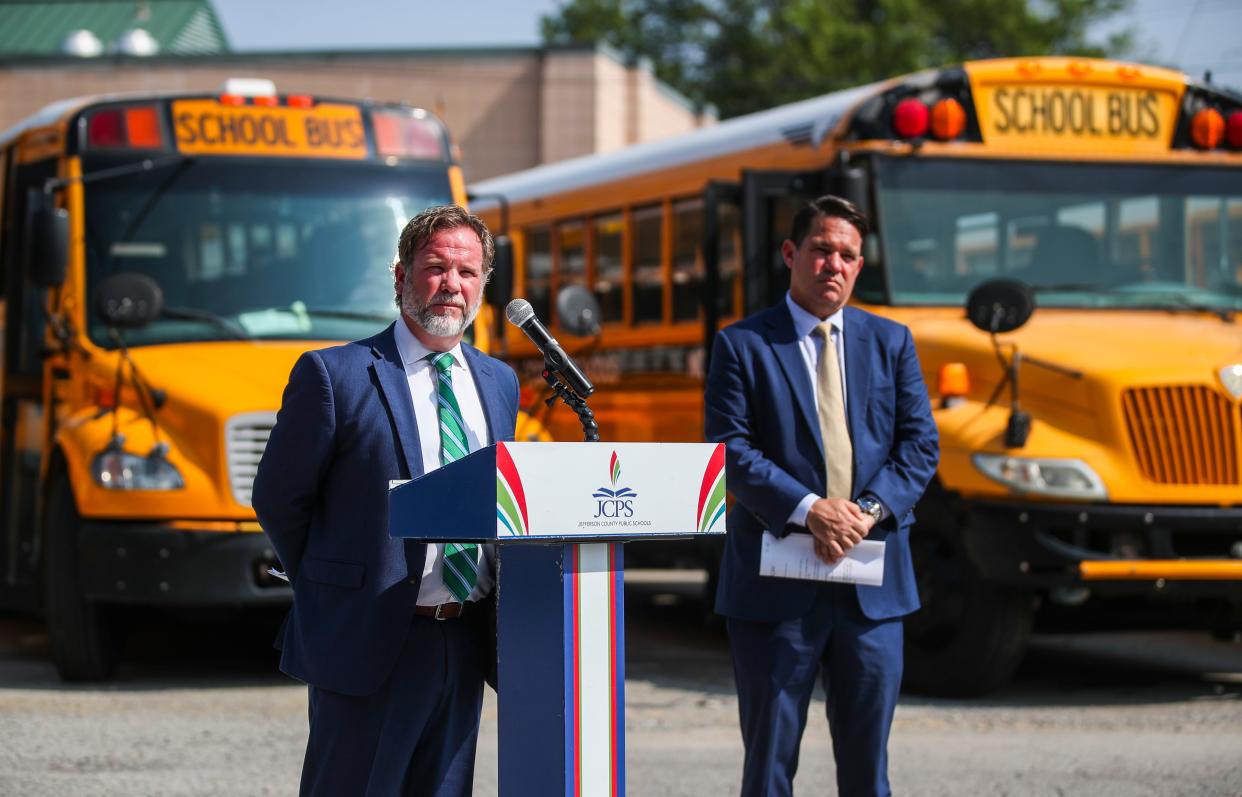 "There are state regulations as far as walk-to-stop distances and we’re well within those," said Chris Perkins, the district's chief operating officer. JCPS Superintendent Marty Pollio is at right. Pollio and Perkins talked about the Bus Finder QR Code during a press conference before the start of the 2023-24 school year July 25, 2003 at the JCPS bus compound Tuesday morning.