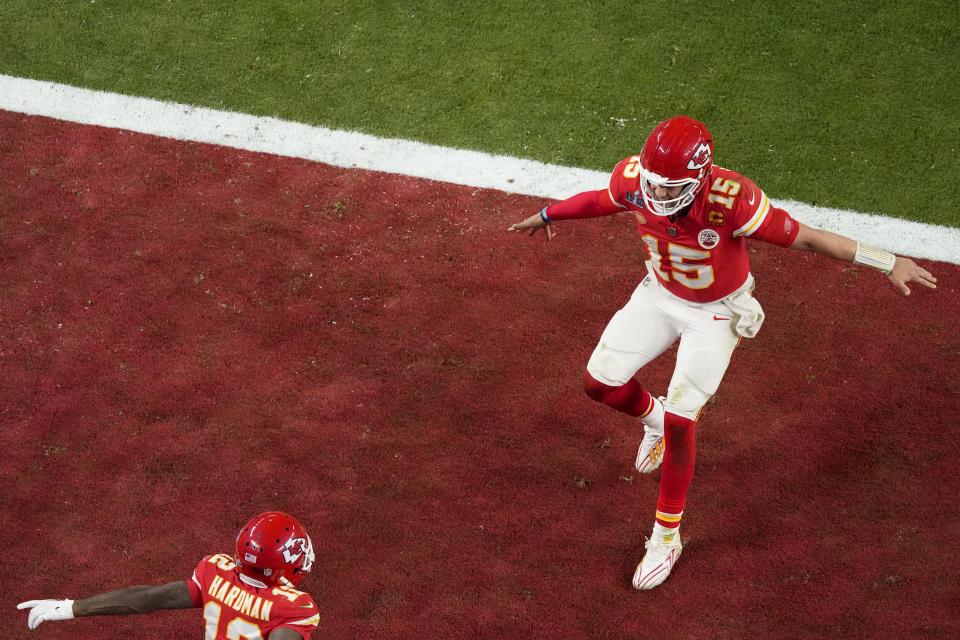 Kansas City Chiefs quarterback Patrick Mahomes, right, celebrates with wide receiver Mecole Hardman Jr. after throwing the game-winning touchdown against the San Francisco 49ers during overtime of the NFL Super Bowl 58 football game Sunday, Feb. 11, 2024, in Las Vegas. (AP Photo/David J. Phillip)